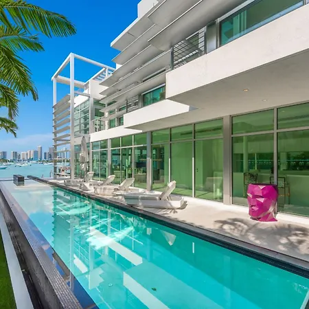 Indulge In Waterfront Elegance Your Ultra Luxury Miami Beach Estate Beckons!